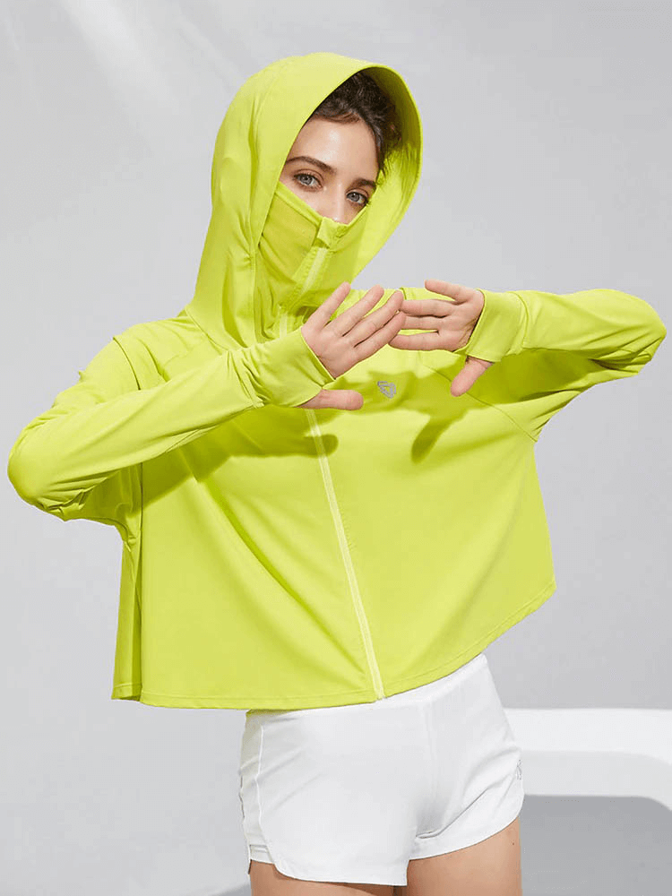 Woman wearing a lime green sun protection hoodie with zipper and long sleeves, perfect for active lifestyle and yoga.